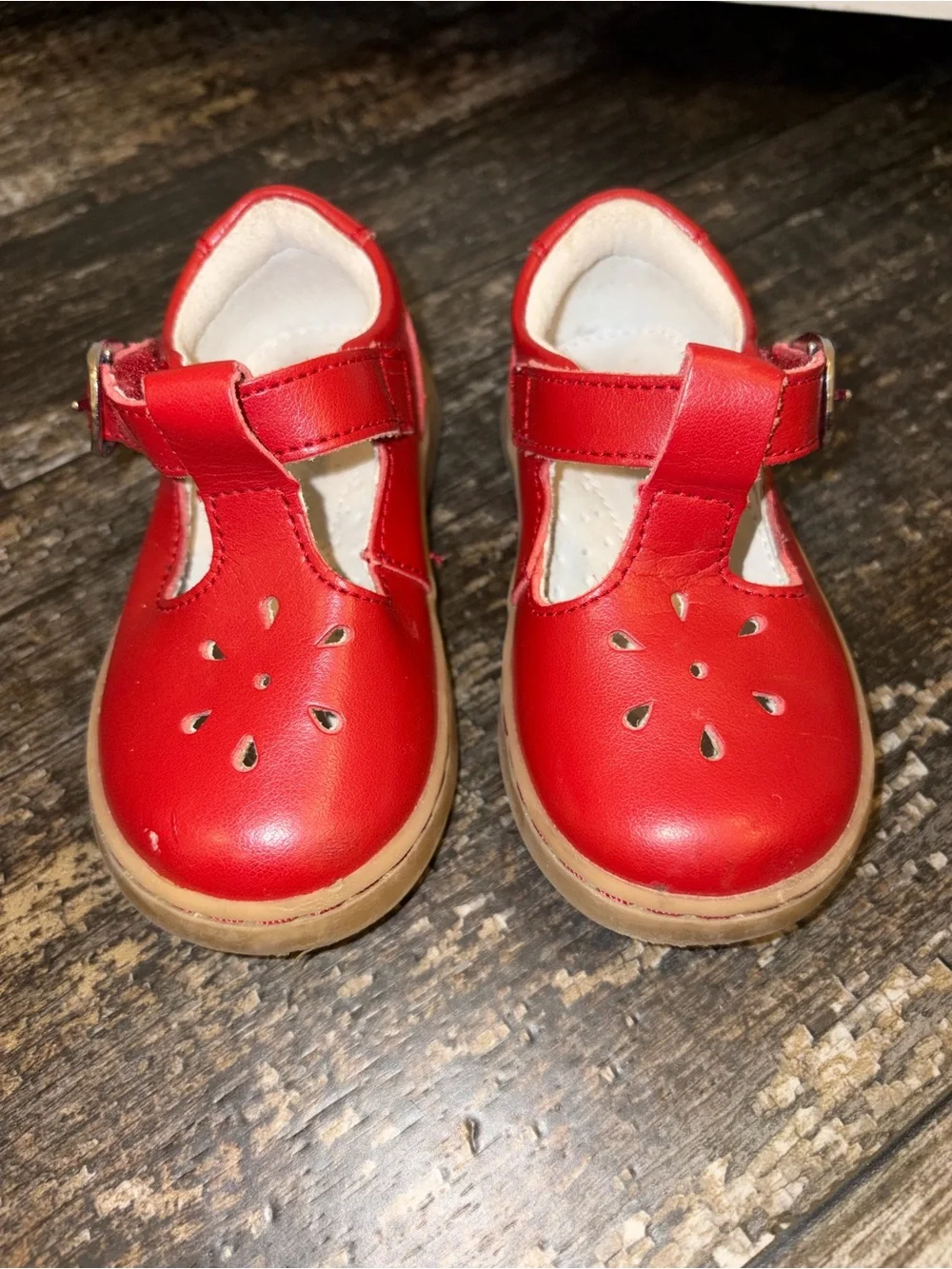 RED L'Amour leather T-strap Mary Jane feature a cutout design adjustable ankle